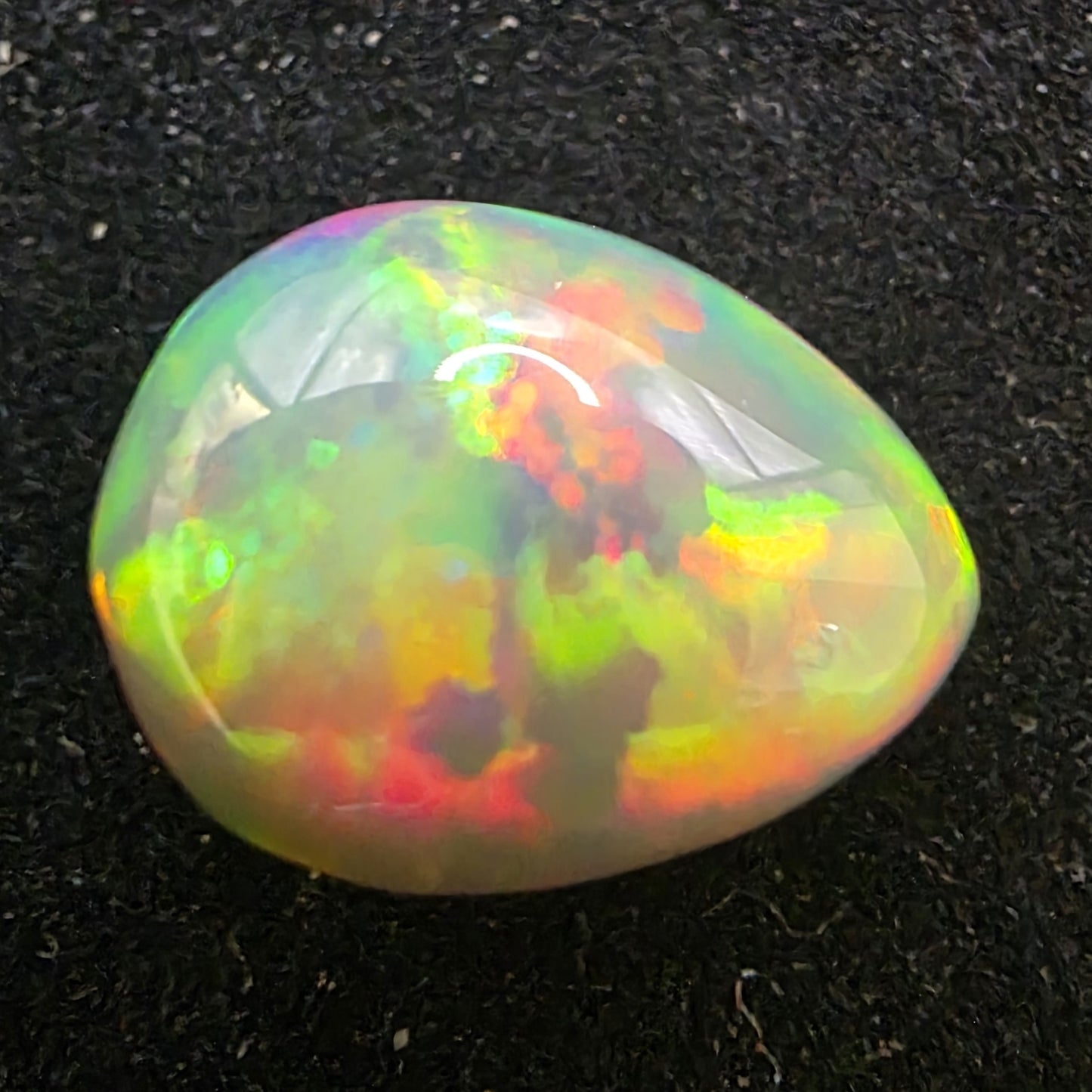 Black Opal special Ethiopian Welo, 3.85 ct pear polished, natural, intense Play-of-Colour