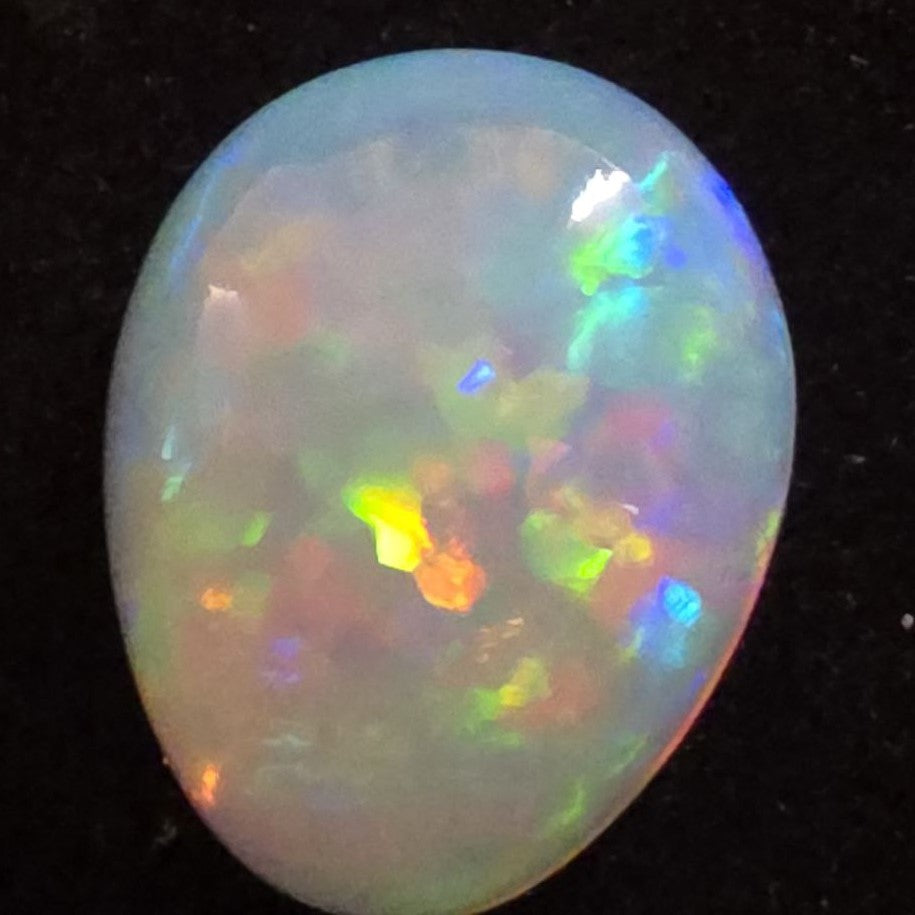 White Opal special Ethiopian Welo, 14.25 ct pear polished, natural, intense Play-of-Colour