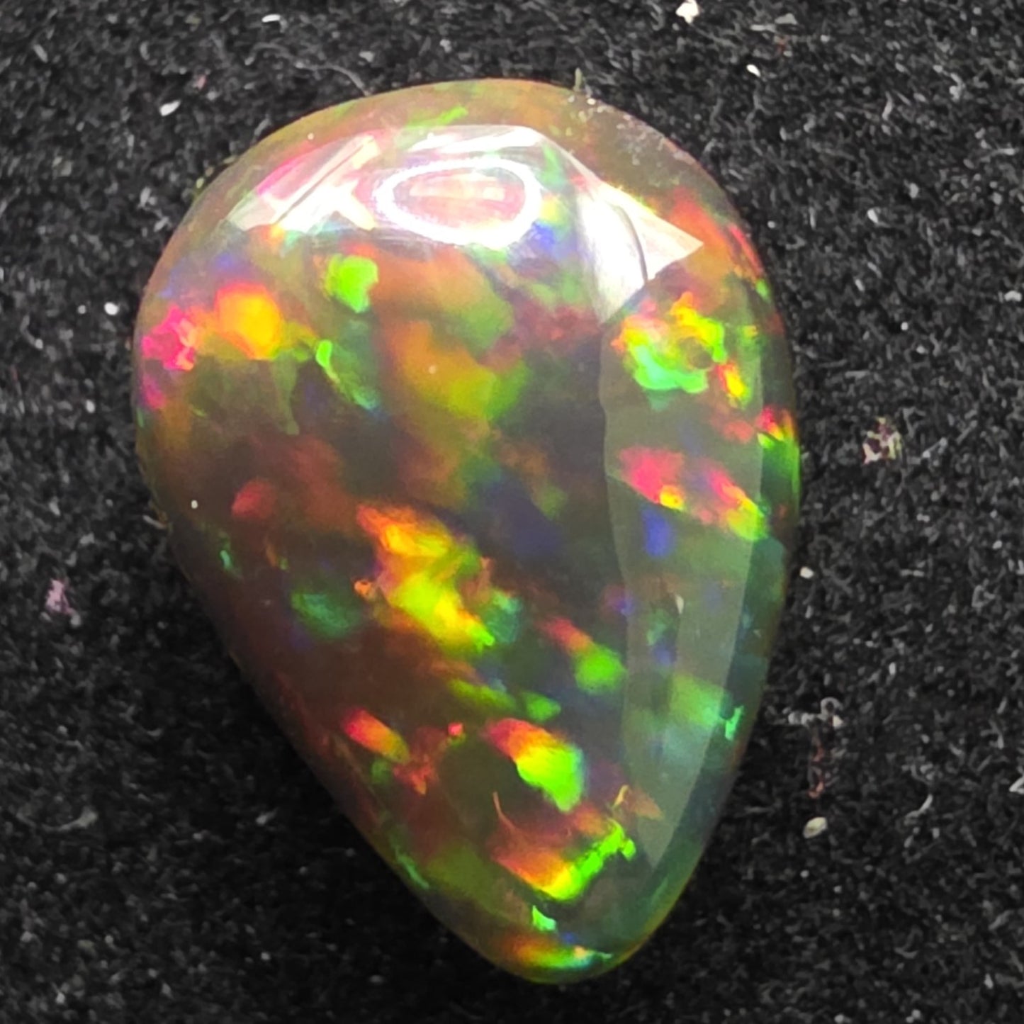 Black Opal special Ethiopian Welo, 2.2 ct pear polished, natural, intense Play-of-Colour
