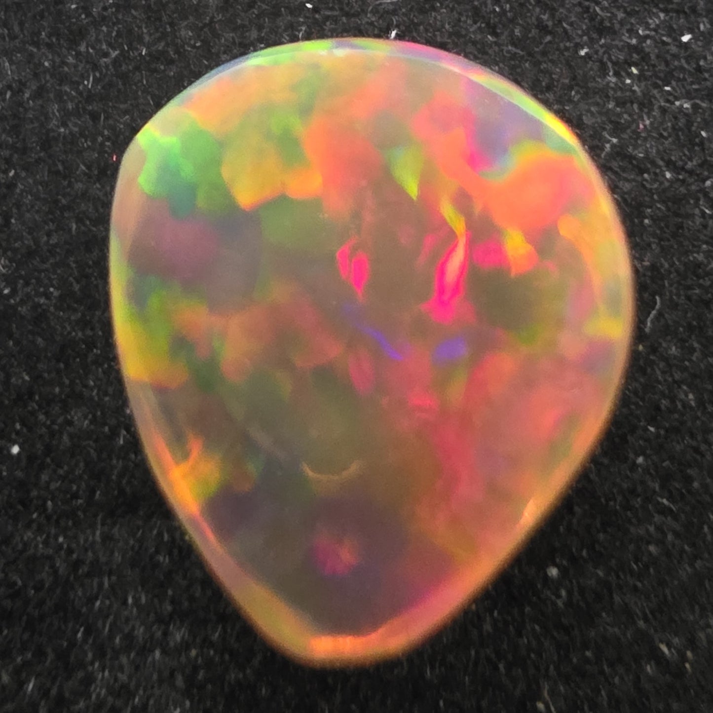 Black Opal special Ethiopian Welo, 3.7 ct pear polished, natural, intense Play-of-Colour