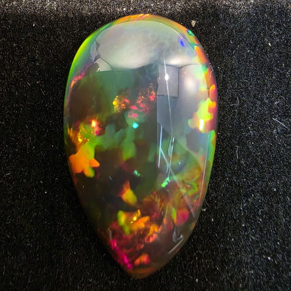 Black Opal outstanding Ethiopian Welo, 12 ct pear polished, natural, intense Play-of-Colour