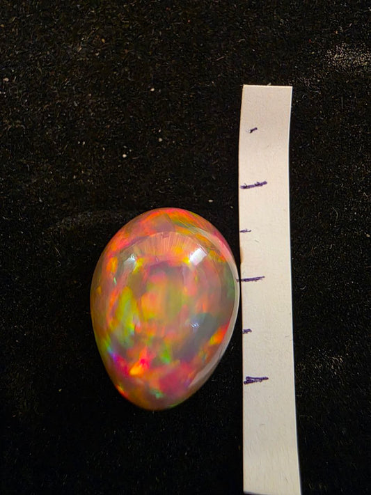 Black Opal special Ethiopian Welo, 14.35 ct pear polished, natural, intense Play-of-Colour