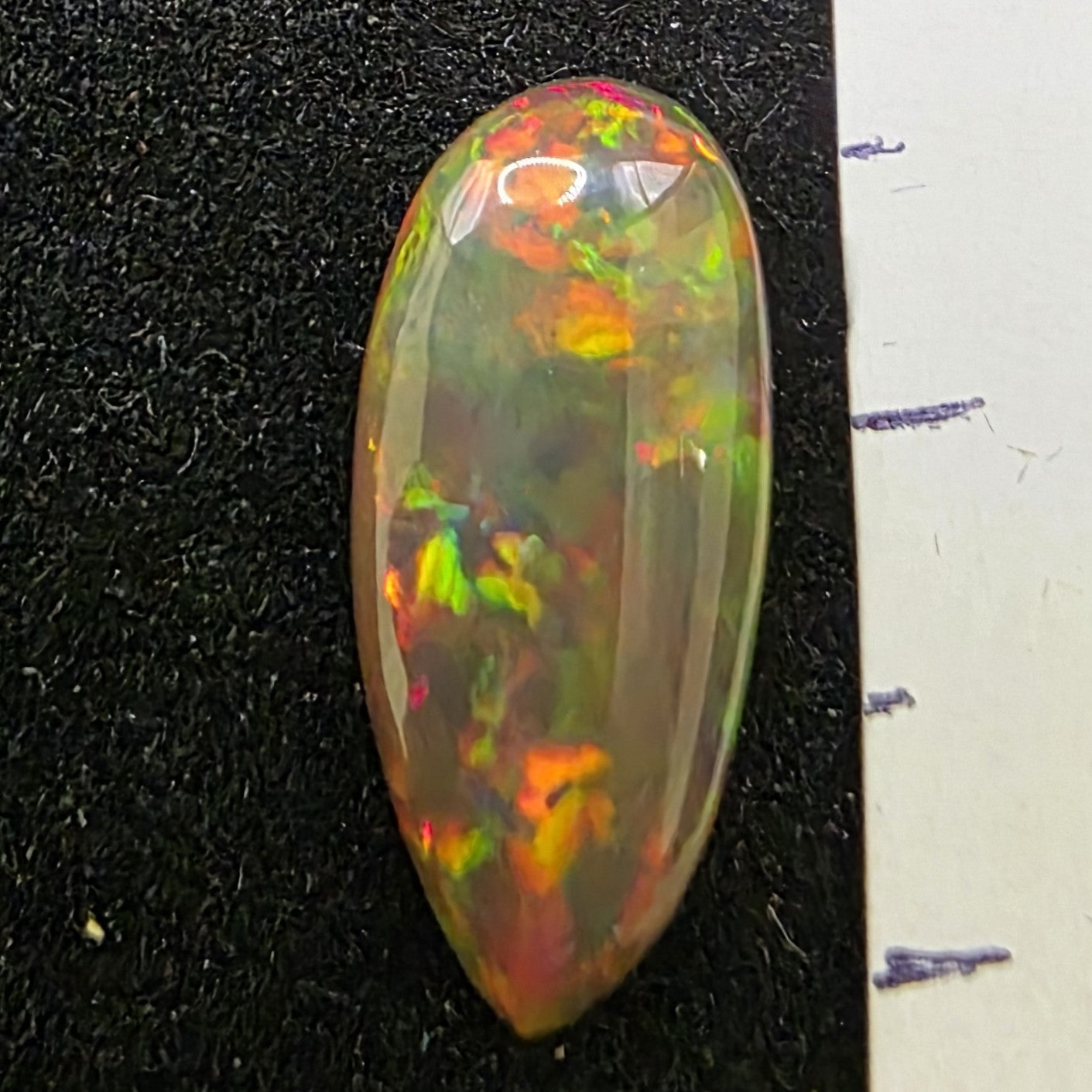 Black Opal special Ethiopian Welo, 2.55 ct pear polished, natural, intense Play-of-Colour