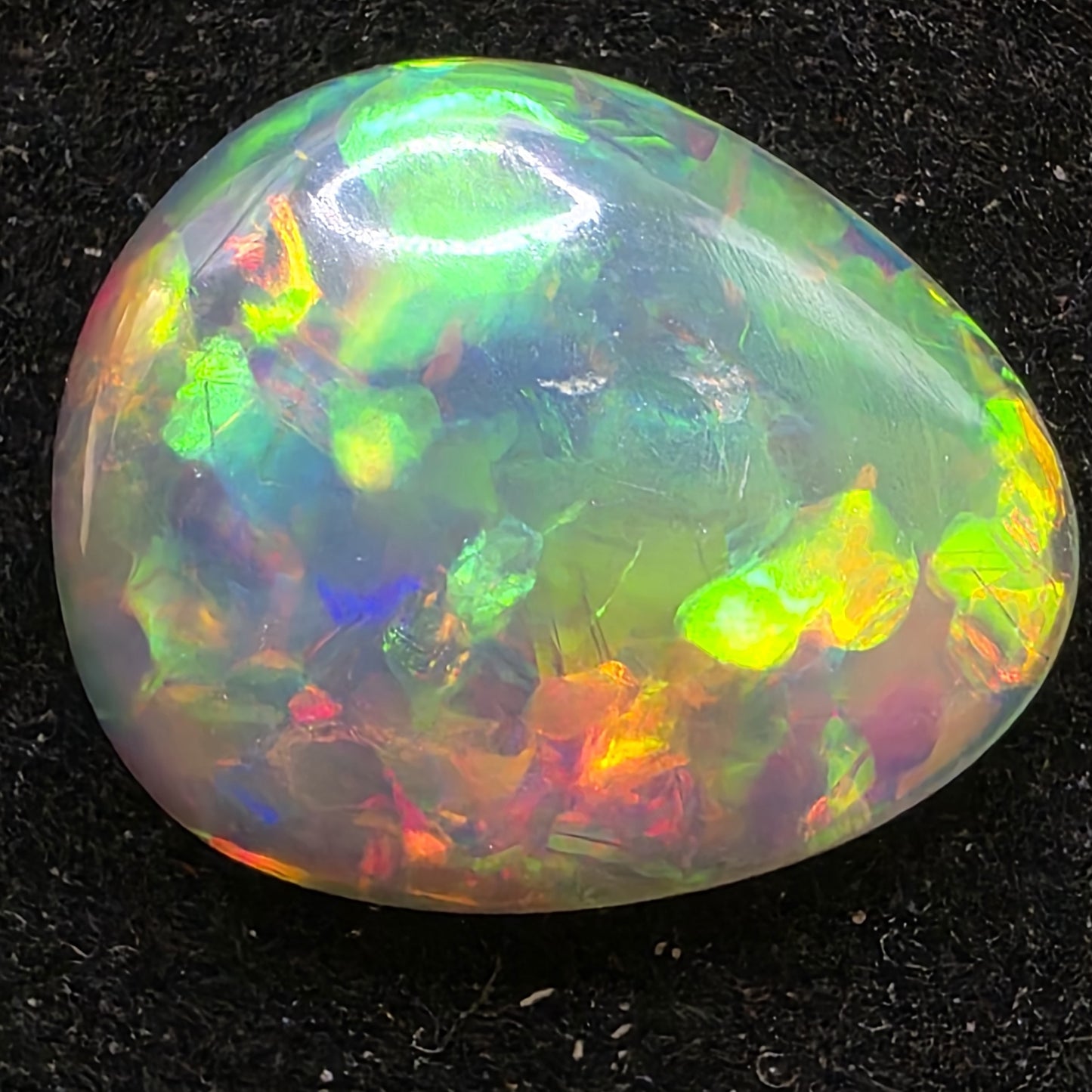 Black Opal special Ethiopian Welo, 6.6 ct pear polished, natural, intense Play-of-Colour