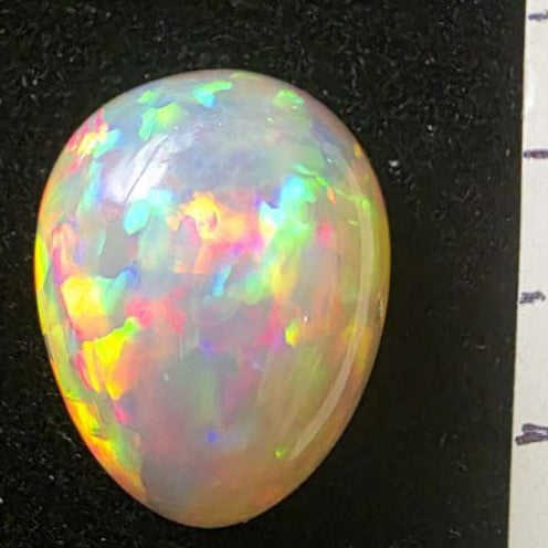 Black Opal special Ethiopian Welo, 7.25 ct pear polished, natural, intense Play-of-Colour