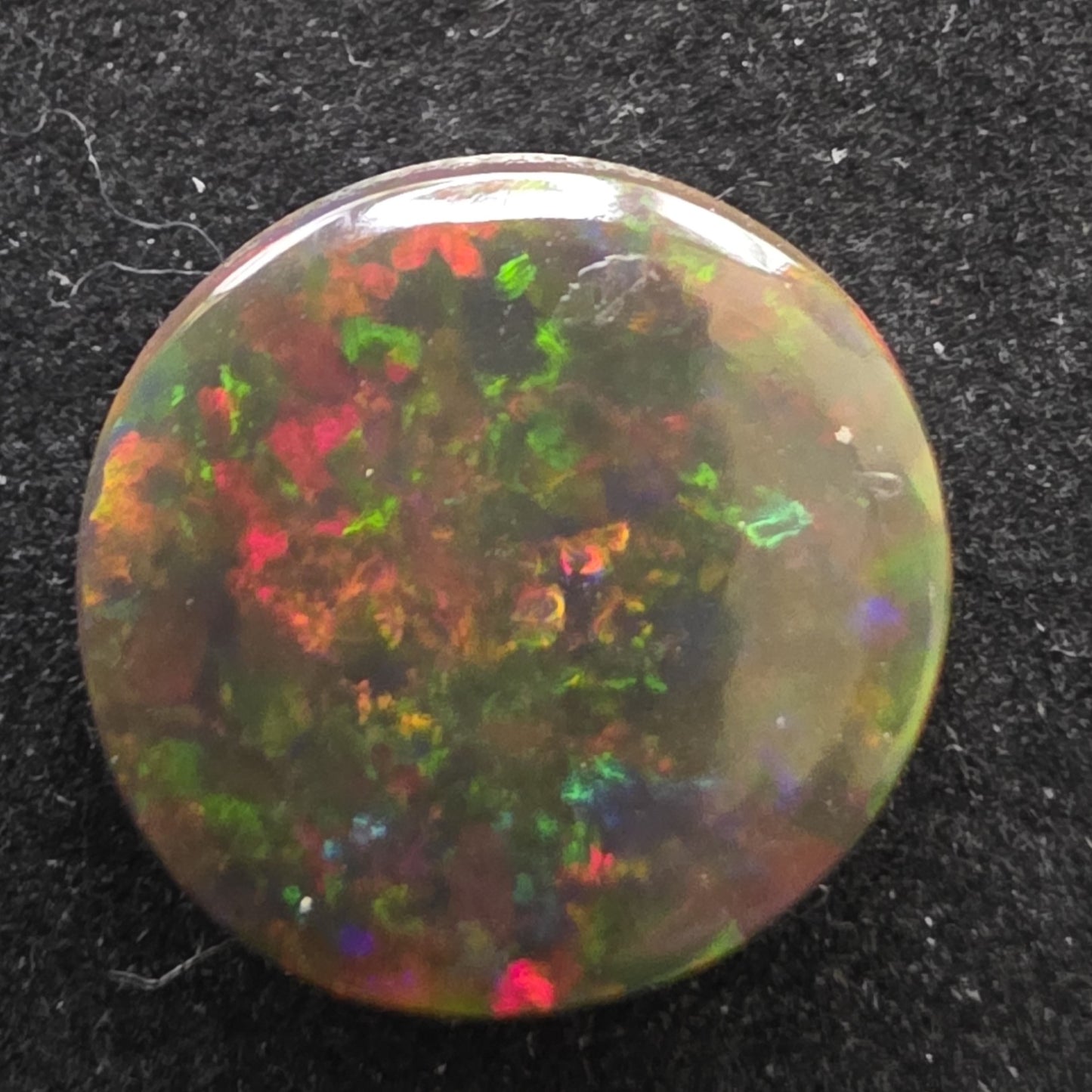 Black Opal special Ethiopian Welo, 6.05 ct oval polished, natural, intense Play-of-Colour