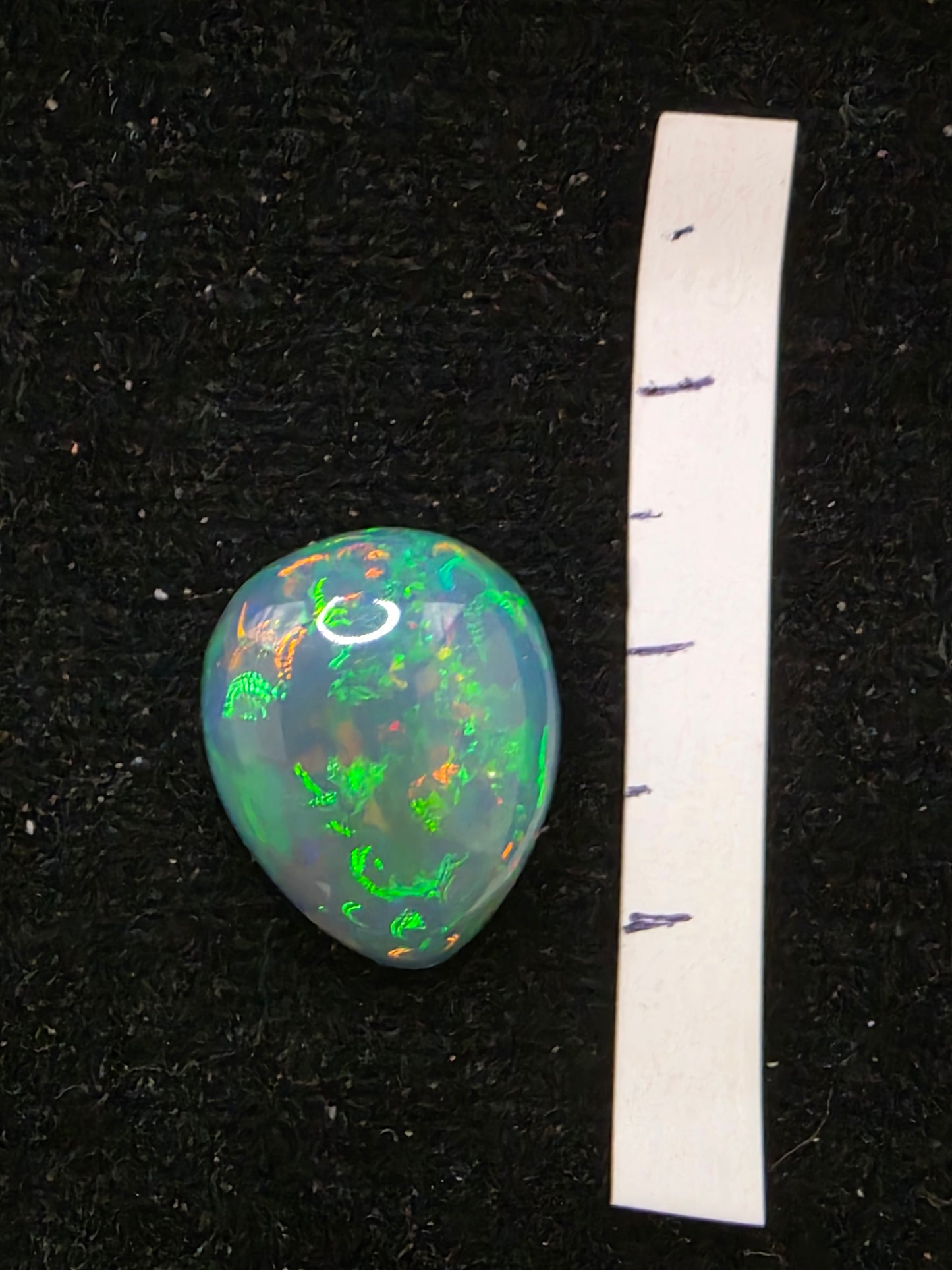 Black Opal special Ethiopian Welo, 5.45 ct pear polished, natural