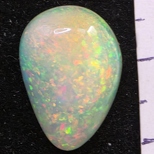 White Opal special Ethiopian Welo, 6.7 ct freeform polished, natural, intense Play-of-Colour