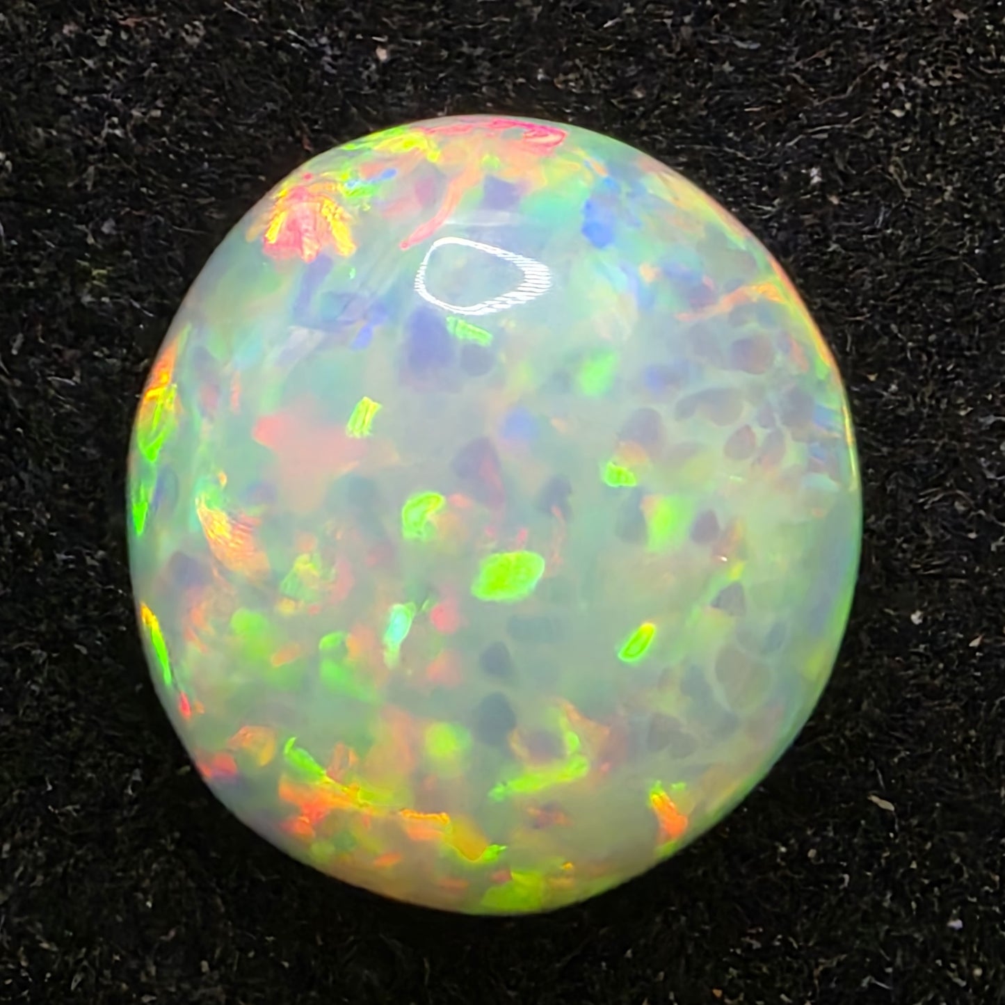 Black Opal special Ethiopian Welo, 2.1 ct round polished, natural, intense Play-of-Colour