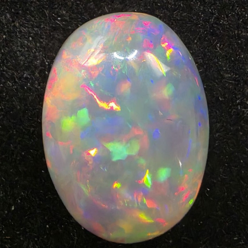 Black Opal special Ethiopian Welo, 6.2 ct oval polished, natural, intense Play-of-Colour