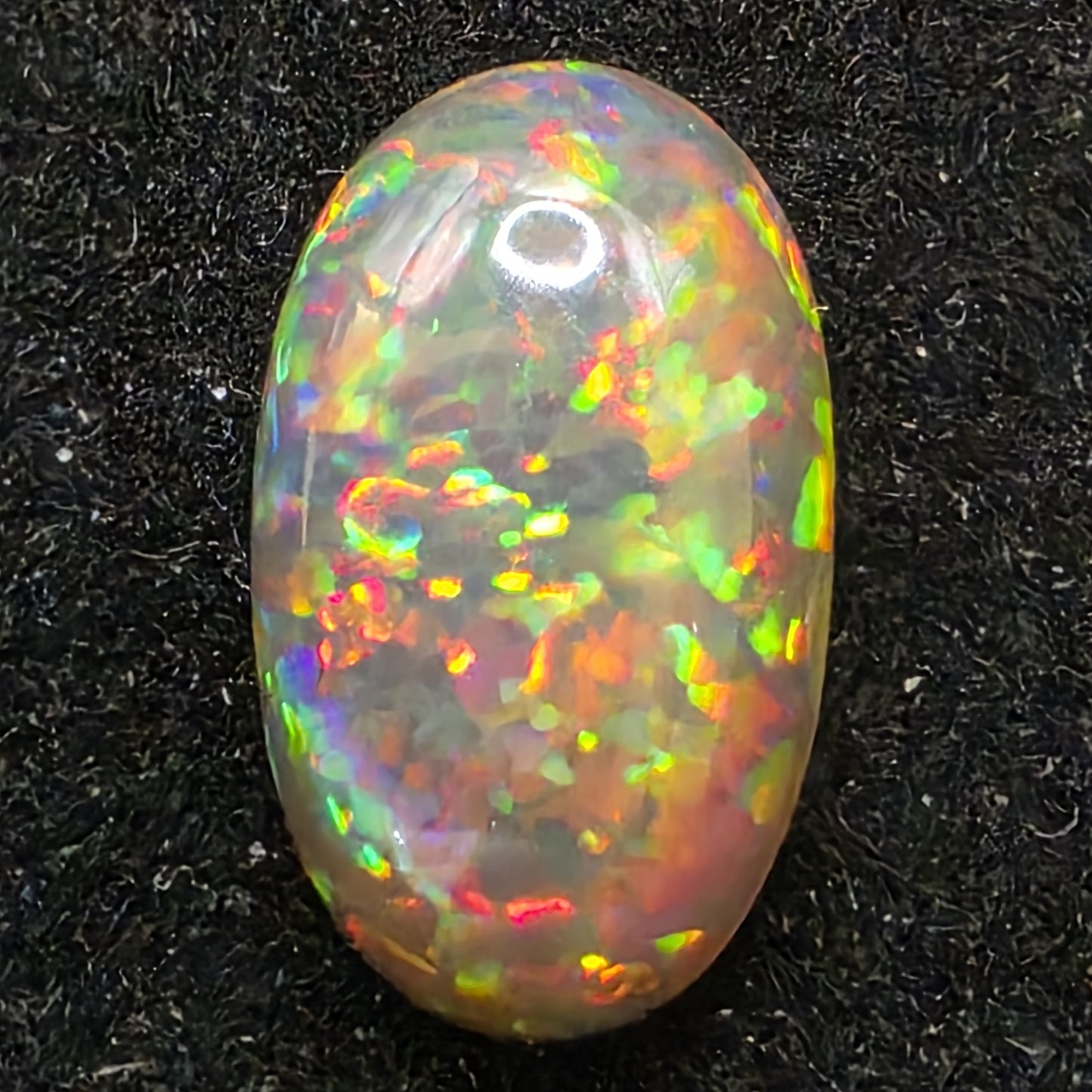Black Opal special Ethiopian Welo, 3.2 ct oval polished, natural, intense Play-of-Colour