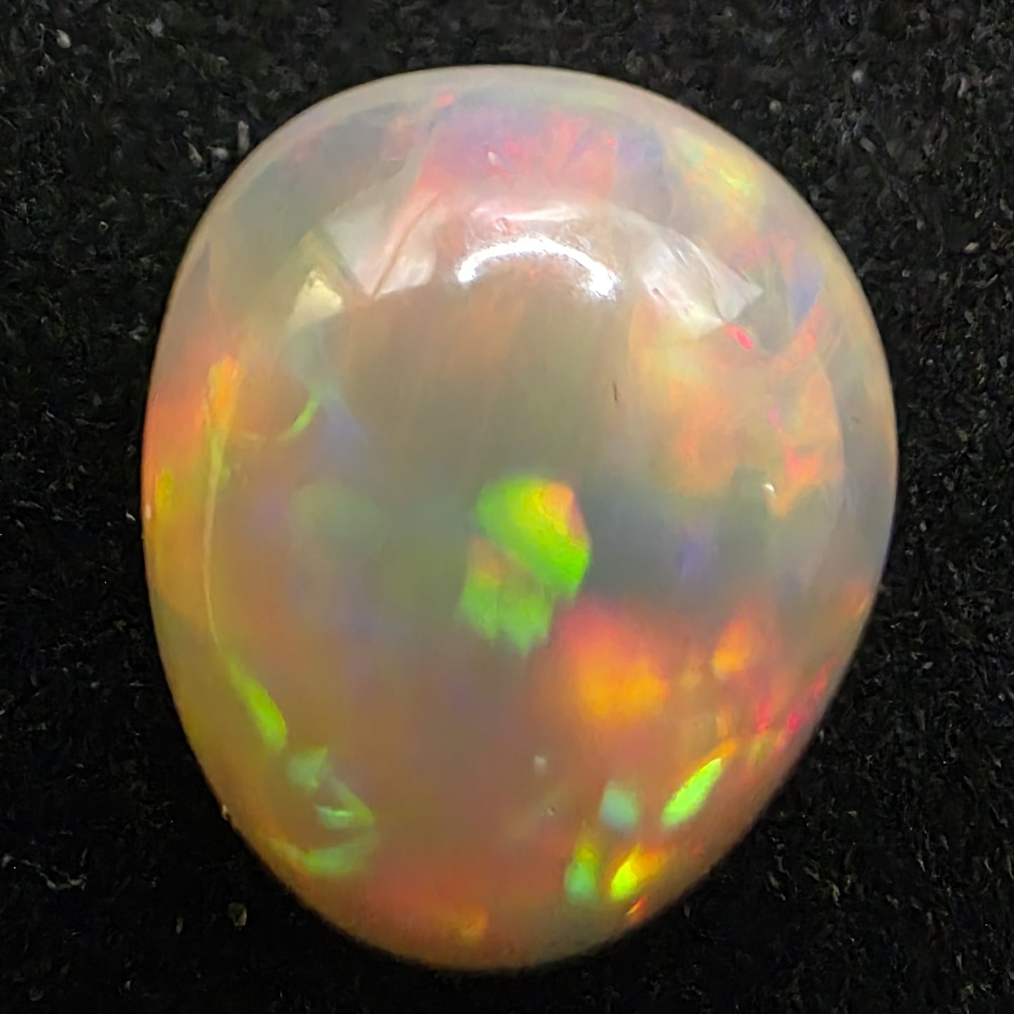 White Opal special Ethiopian Welo, 9.3 ct pear polished, natural, intense Play-of-Colour