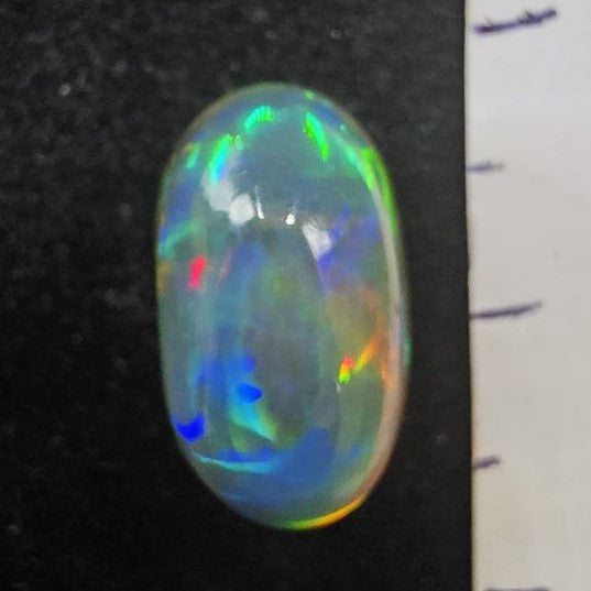Black Opal special Ethiopian Welo, 4.8 ct oval polished, natural, intense Play-of-Colour