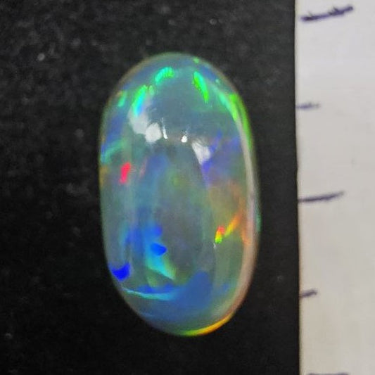 Black Opal special Ethiopian Welo, 4.8 ct oval polished, natural, intense Play-of-Colour