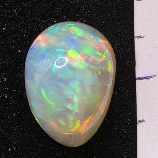 White Opal special Ethiopian Welo, 6.7 ct freeform polished, natural, intense Play-of-Colour