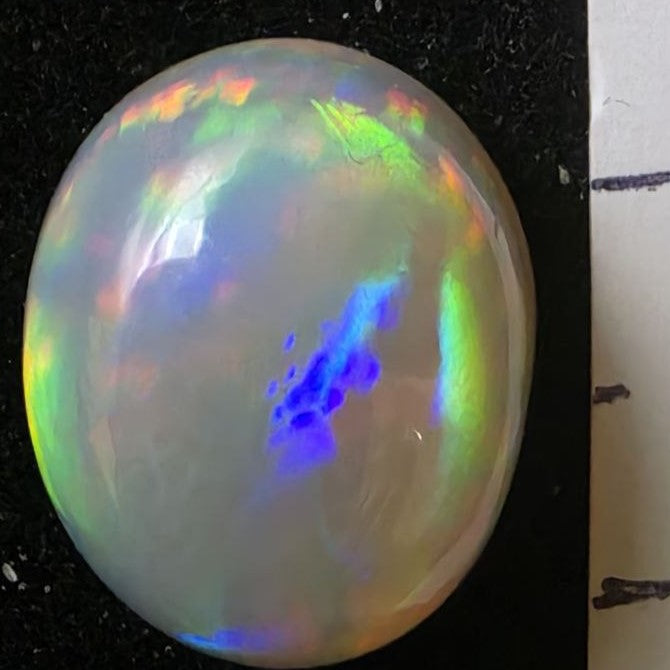 Black Opal special Ethiopian Welo, 7.25 ct oval polished, natural, intense Play-of-Colour