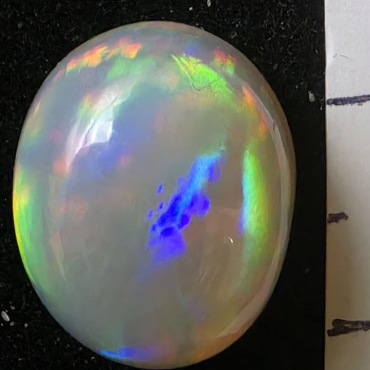Black Opal special Ethiopian Welo, 7.25 ct oval polished, natural, intense Play-of-Colour