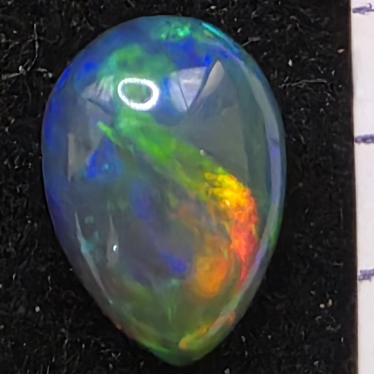 Black Opal special Ethiopian Welo, 3.45 ct pear polished, natural, intense Play-of-Colour