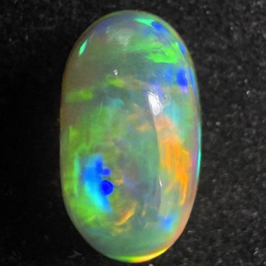 Black Opal special Ethiopian Welo, 4.8 ct oval polished, natural, intense Play-of-Colour