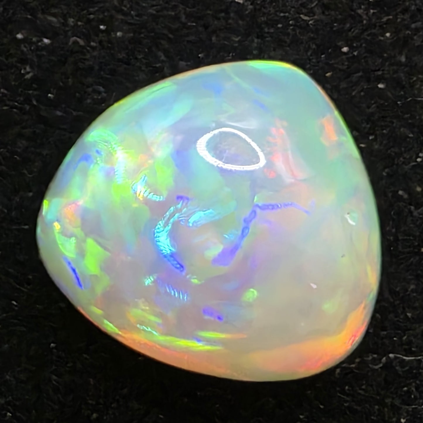 White Opal special Ethiopian Welo, 7.2 ct freeform polished, natural, intense Play-of-Colour