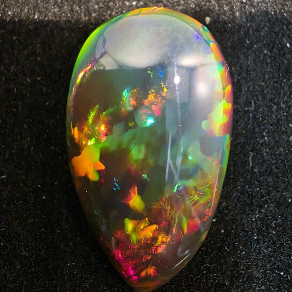 Black Opal outstanding Ethiopian Welo, 12 ct pear polished, natural, intense Play-of-Colour