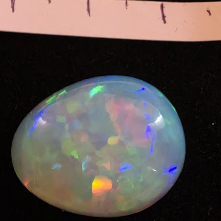 White Opal special Ethiopian Welo, 14.25 ct pear polished, natural, intense Play-of-Colour