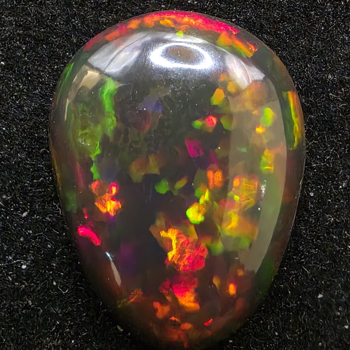 Black Opal special Ethiopian Welo, 5.9 ct pear polished, natural, intense Play-of-Colour