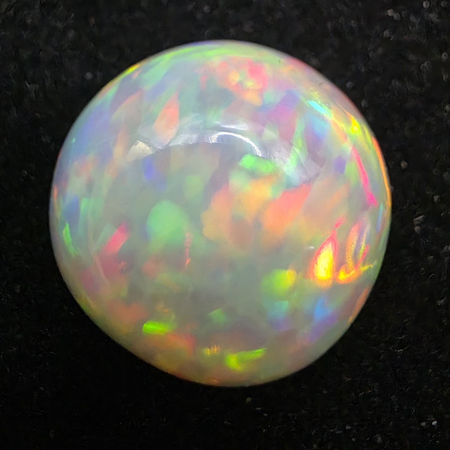 Honeycomb White Opal special Ethiopian Welo, 8.7 ct freeform polished, natural, intense Play-of-Colour
