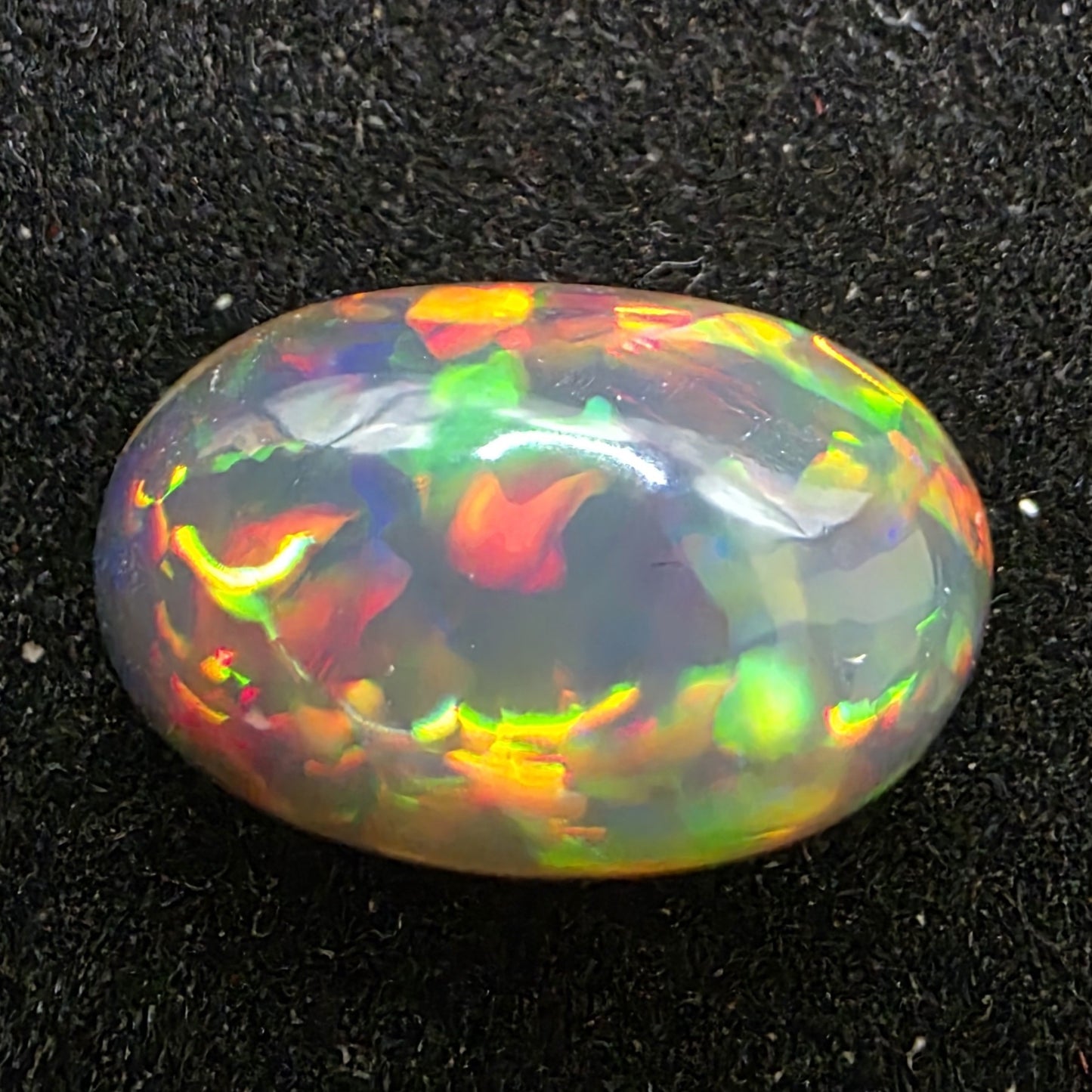 Black Opal special Ethiopian Welo, 2.95 ct oval polished, natural, intense Play-of-Colour