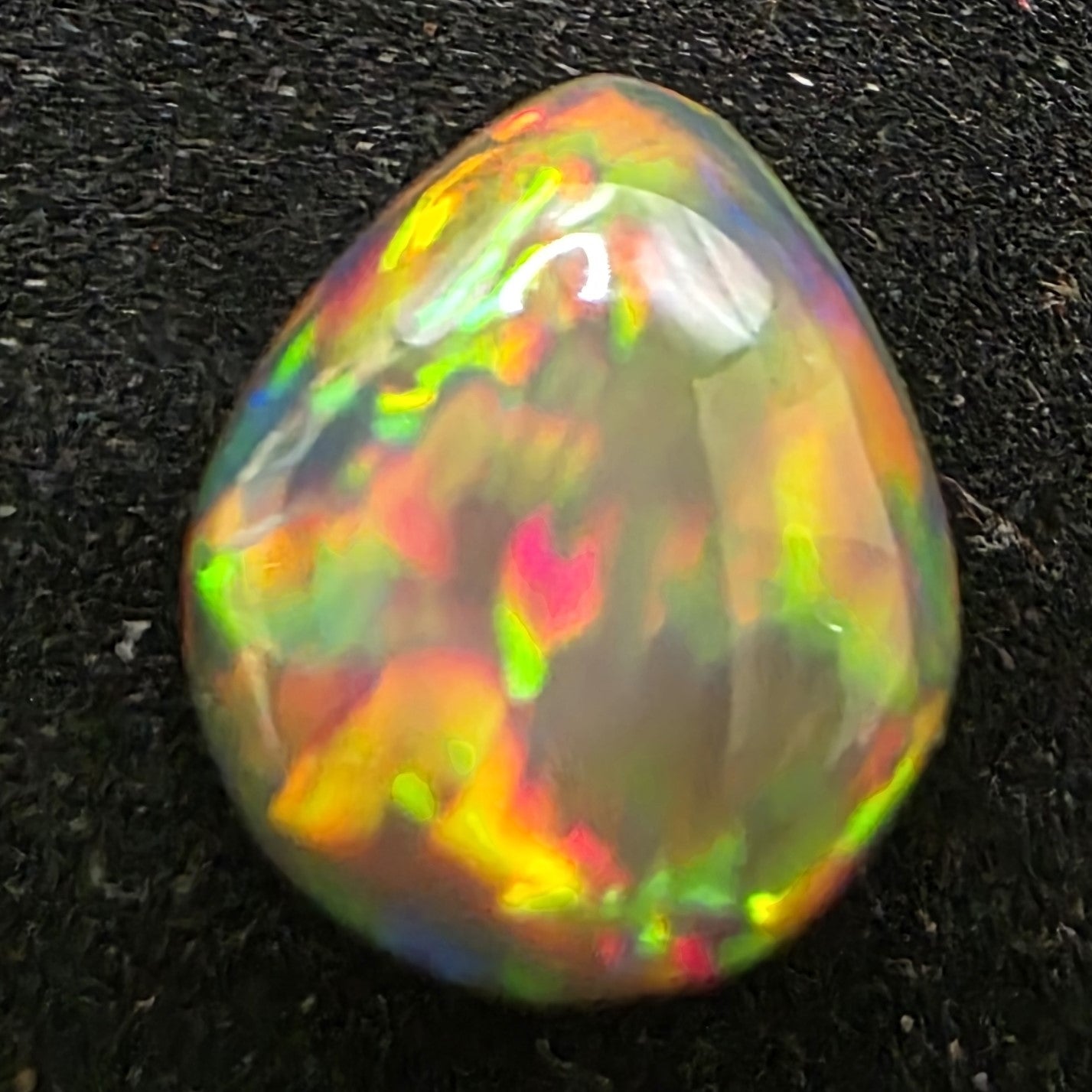 Black Opal special Ethiopian Welo, 3.7 ct pear polished, natural, intense Play-of-Colour