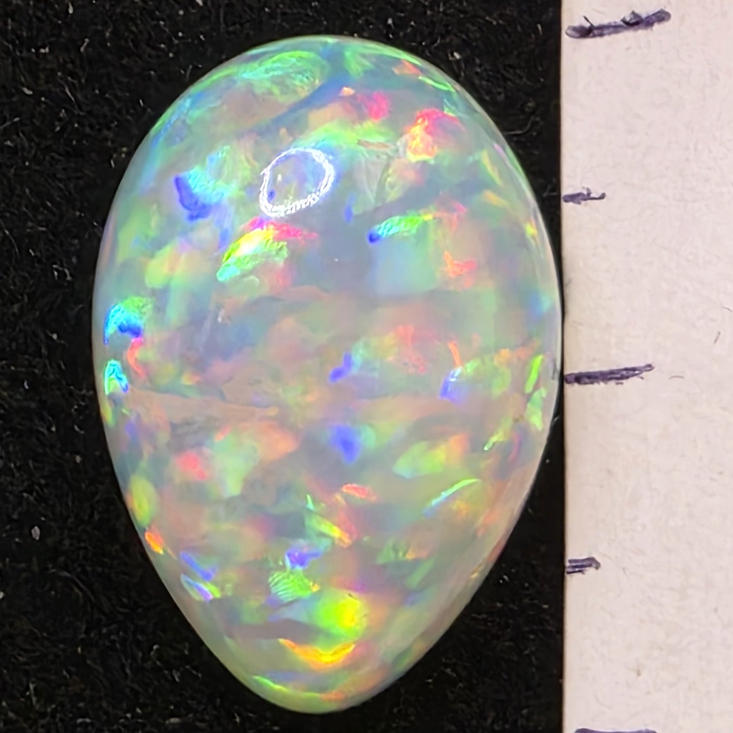 White Opal special Ethiopian Welo, 8.5 ct pear polished, natural, intense Play-of-Colour