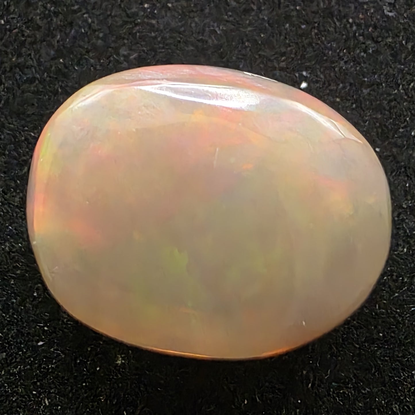 Black Opal special Ethiopian Welo, 21.2 ct oval polished, natural, intense Play-of-Colour