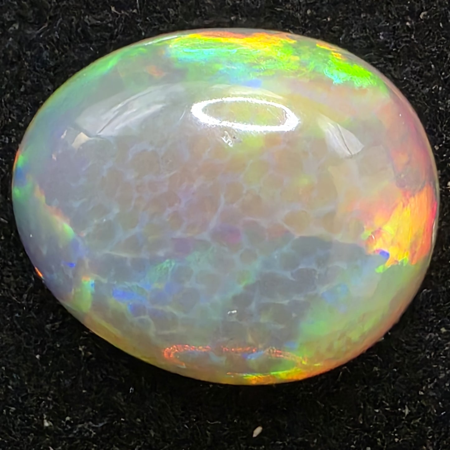 Black Opal special Ethiopian Welo, 7 ct pear polished, natural, intense Play-of-Colour