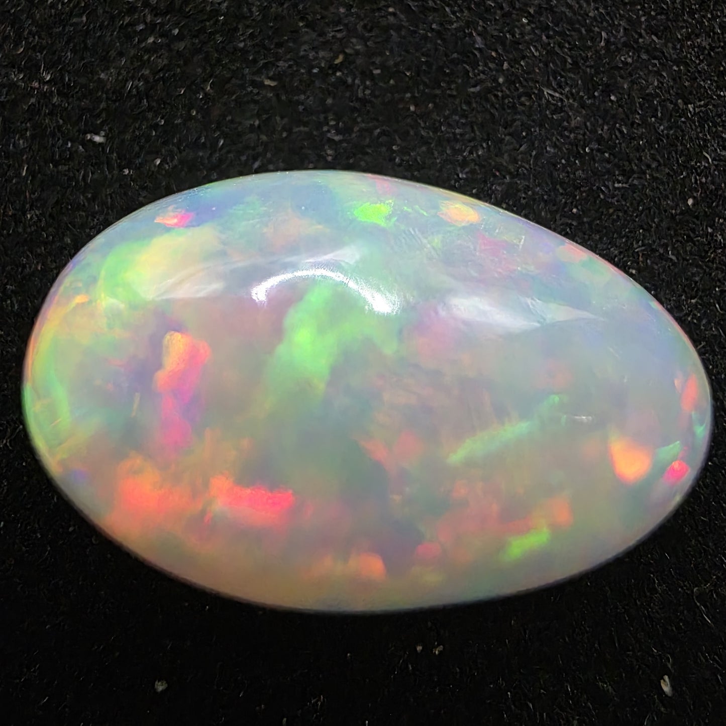White Opal special Ethiopian Welo, 8.9 ct pear polished, natural, intense Play-of-Colour