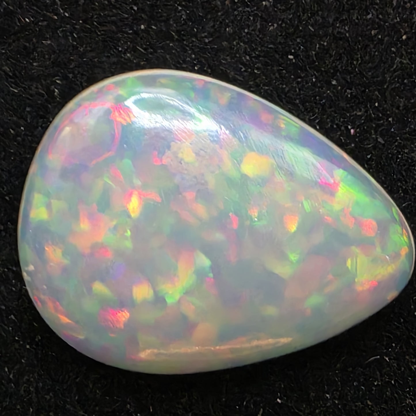 White Opal special Ethiopian Welo, 6.2 ct pear polished, natural, intense Play-of-Colour