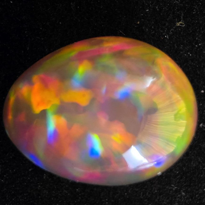 Black Opal special Ethiopian Welo, 14.35 ct pear polished, natural, intense Play-of-Colour