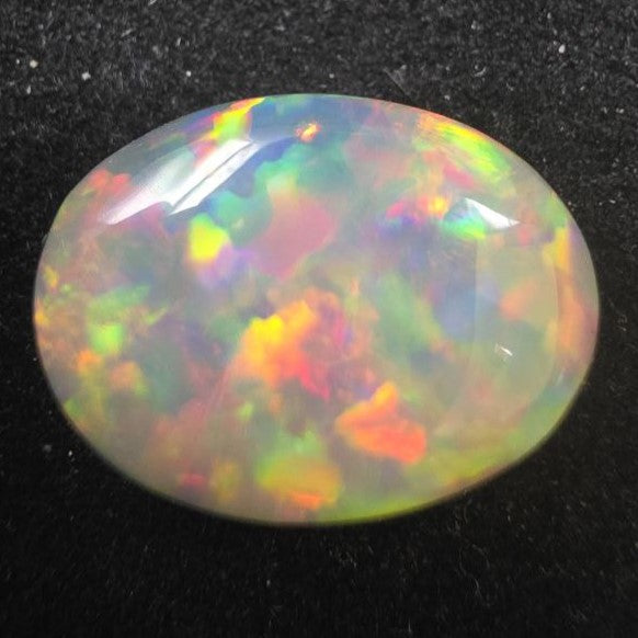 Black Opal special Ethiopian Welo, 6.2 ct oval polished, natural, intense Play-of-Colour