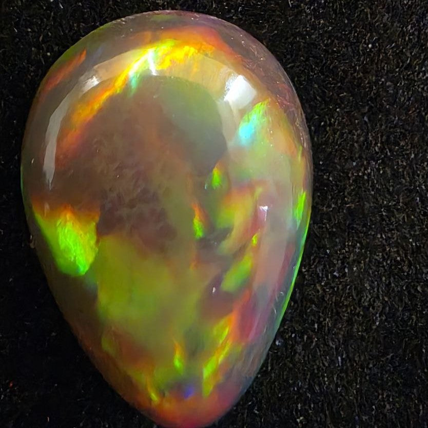 Perfect! Black Opal outstanding Ethiopian Welo, 6.45 ct pear polished, natural, intense Play-of-Colour