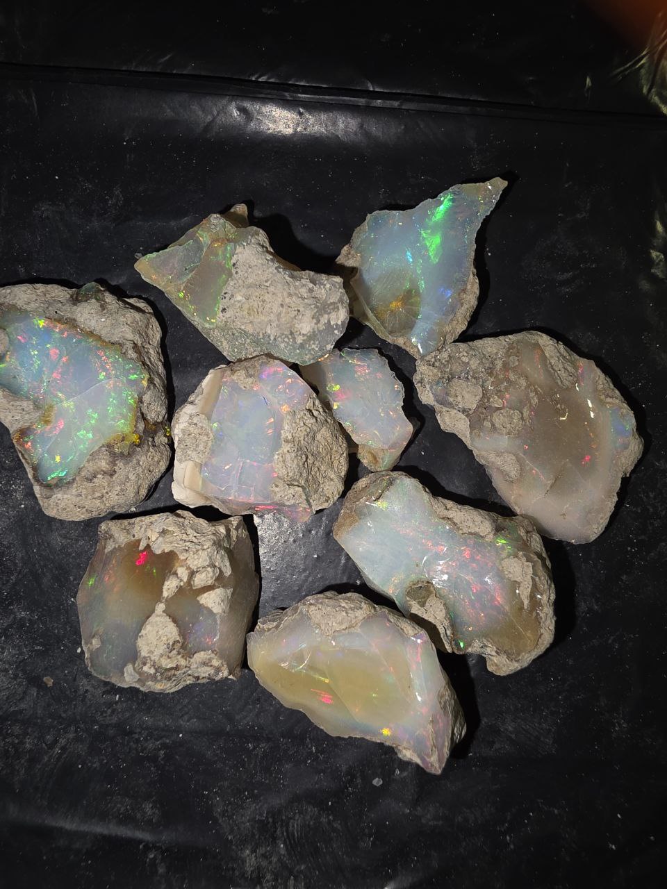 Micro-lot rough, 9 stones Mixed Opal Ethiopian Welo, 121 ct rough, natural