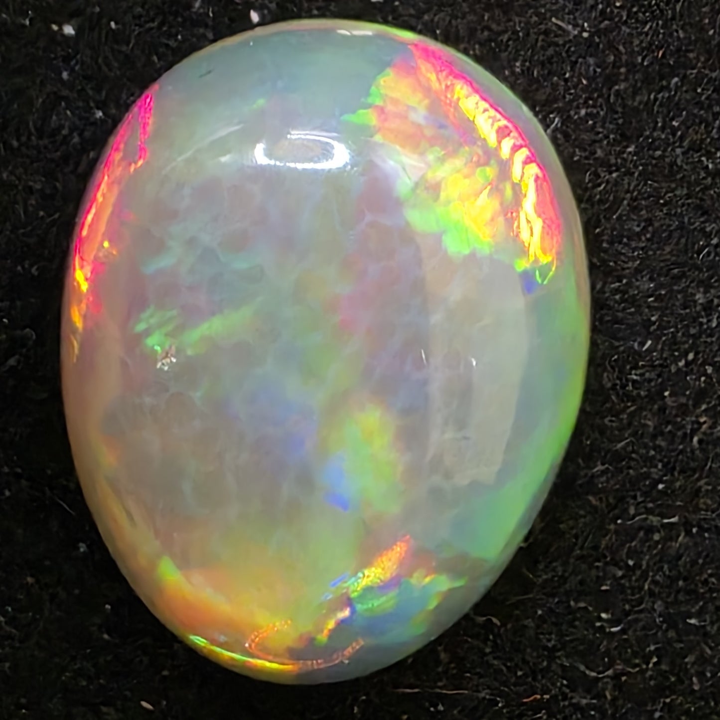Black Opal special Ethiopian Welo, 7 ct pear polished, natural, intense Play-of-Colour
