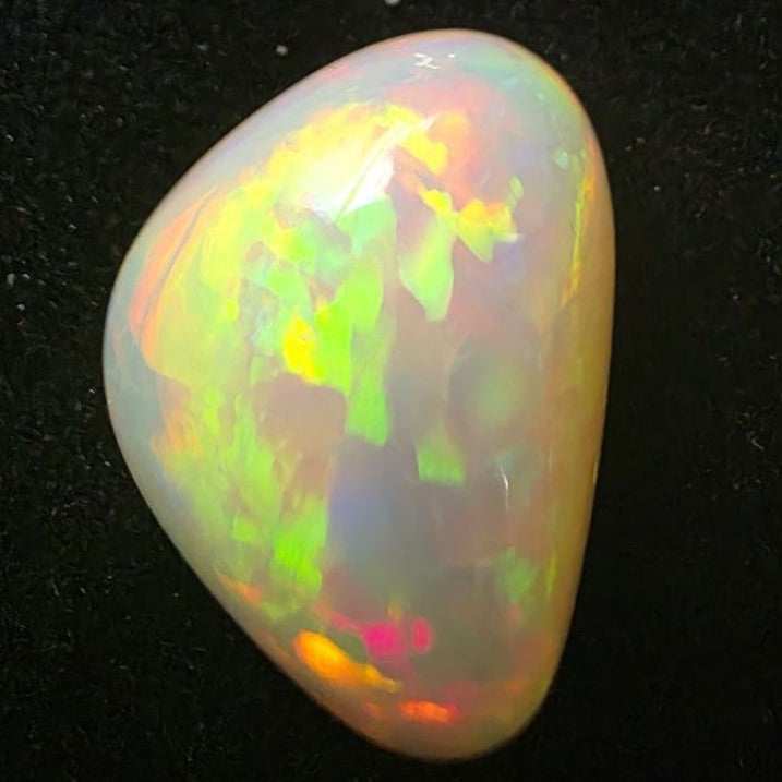 White Opal special Ethiopian Welo, 15 ct freeform polished, natural, intense Play-of-Colour