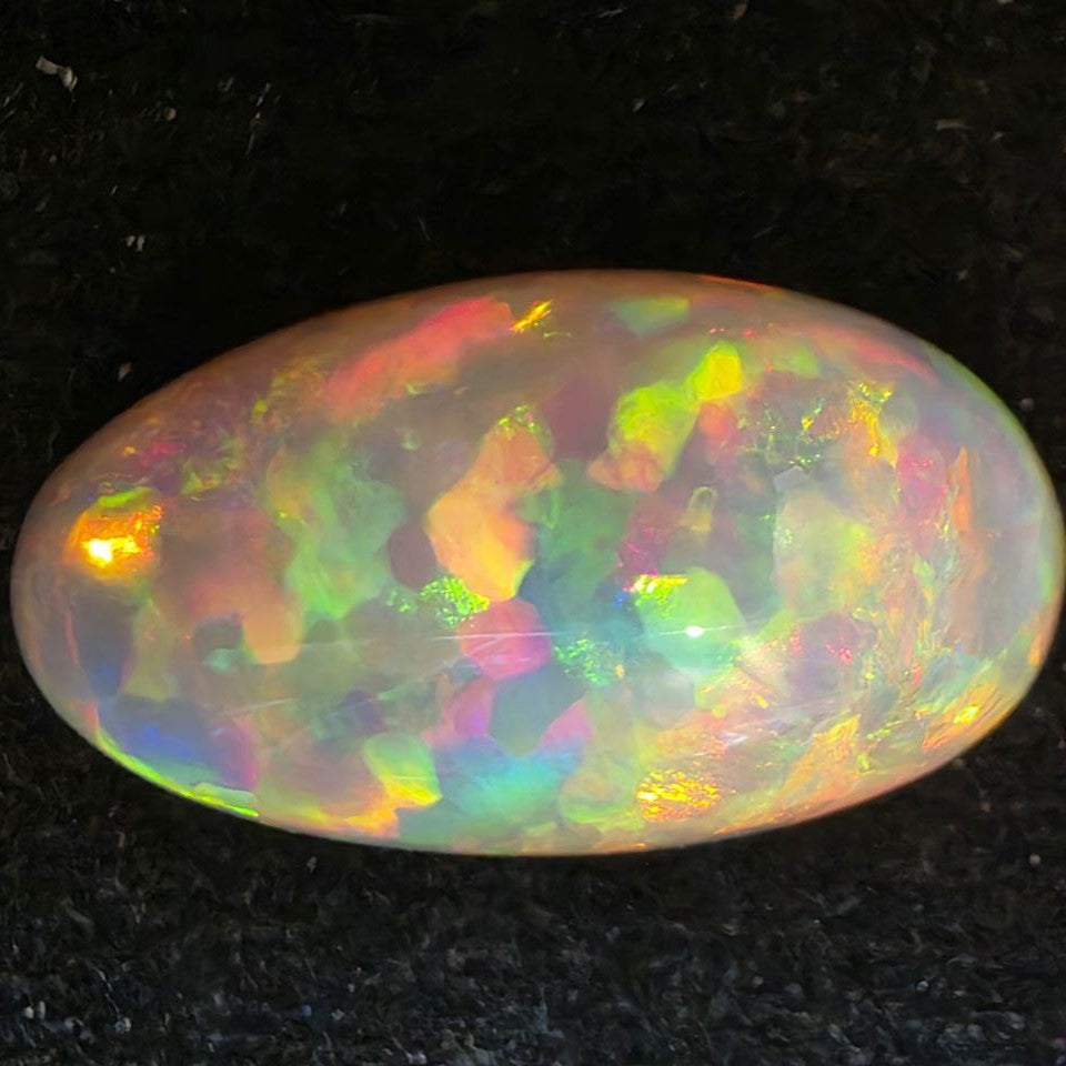 White Opal special Ethiopian Welo, 12.25 ct freeform polished, natural, intense Play-of-Colour