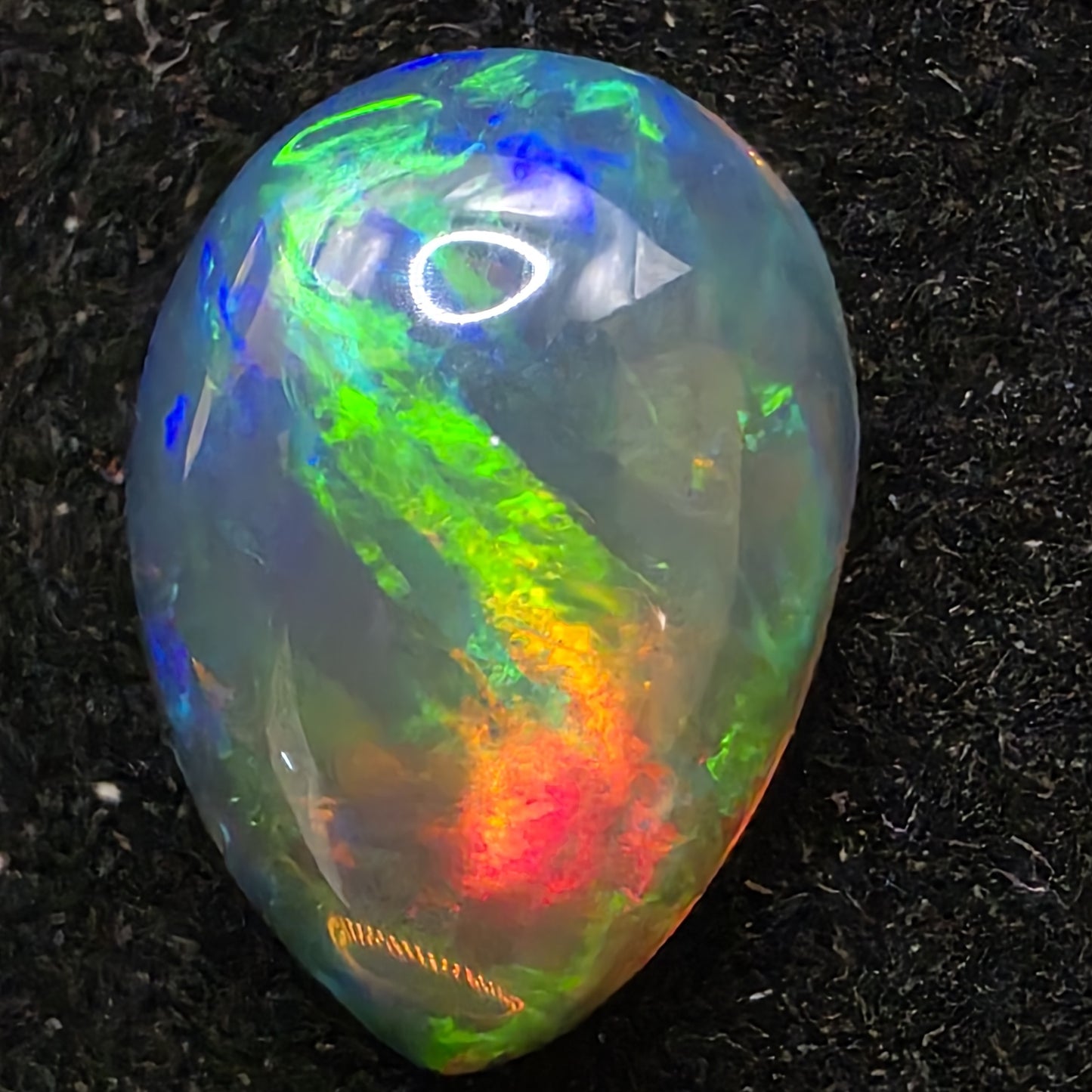 Black Opal special Ethiopian Welo, 3.45 ct pear polished, natural, intense Play-of-Colour