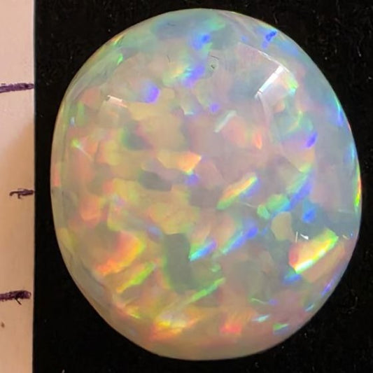 White Opal special Ethiopian Welo, 8.55 ct round polished, natural, intense Play-of-Colour