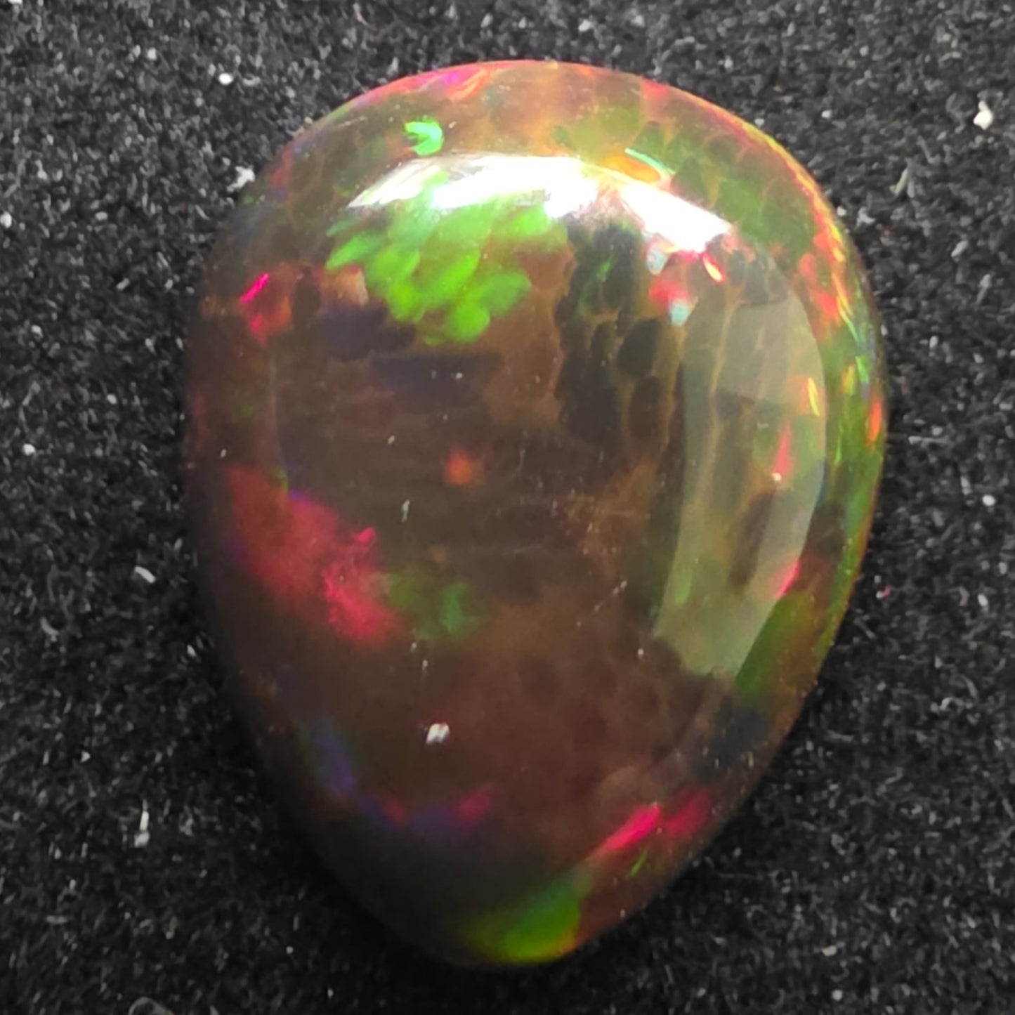 Black Opal special Ethiopian Welo, 4.7 ct pear polished, natural, intense Play-of-Colour