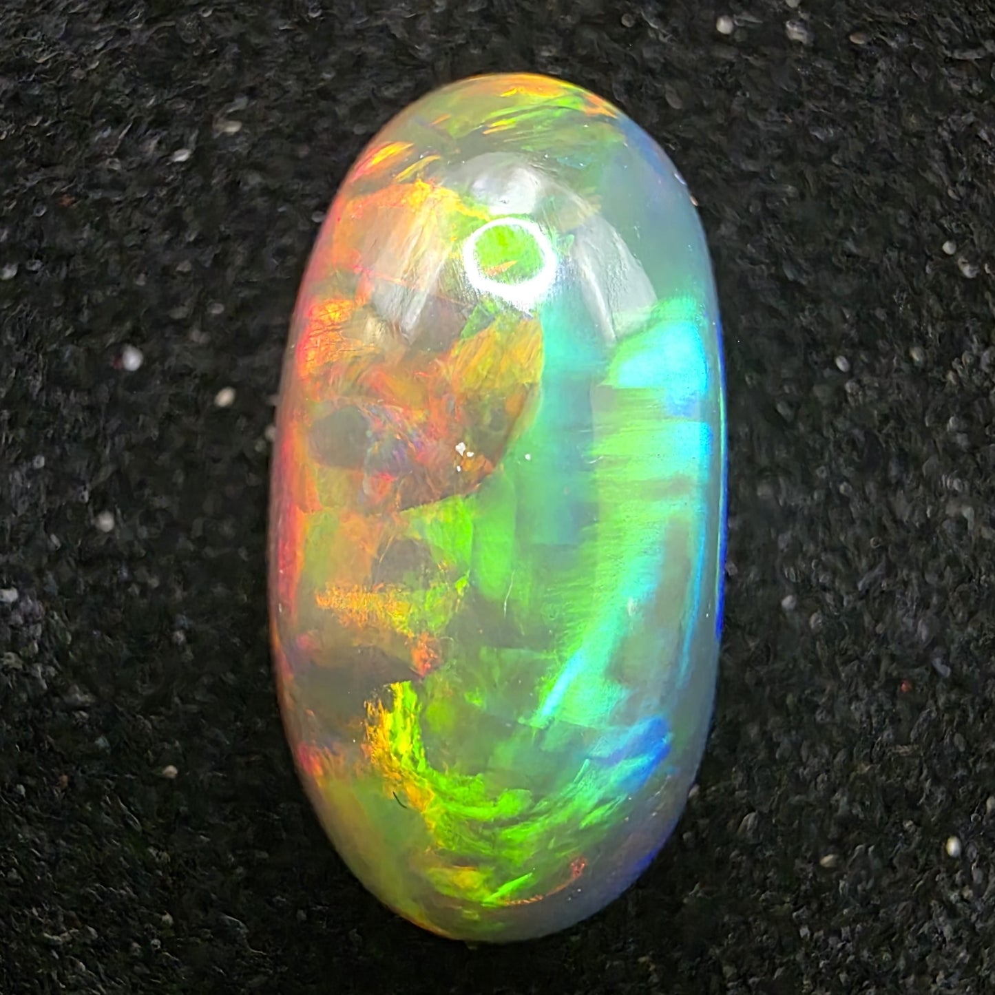 Black Opal special Ethiopian Welo, 5.4 ct oval polished, natural, intense Play-of-Colour