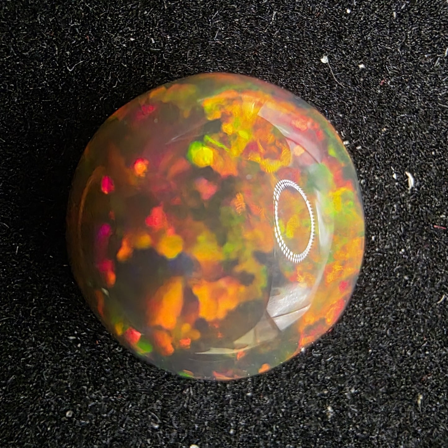 Black Opal special Ethiopian Welo, 4.25 ct round polished, natural, intense Play-of-Colour