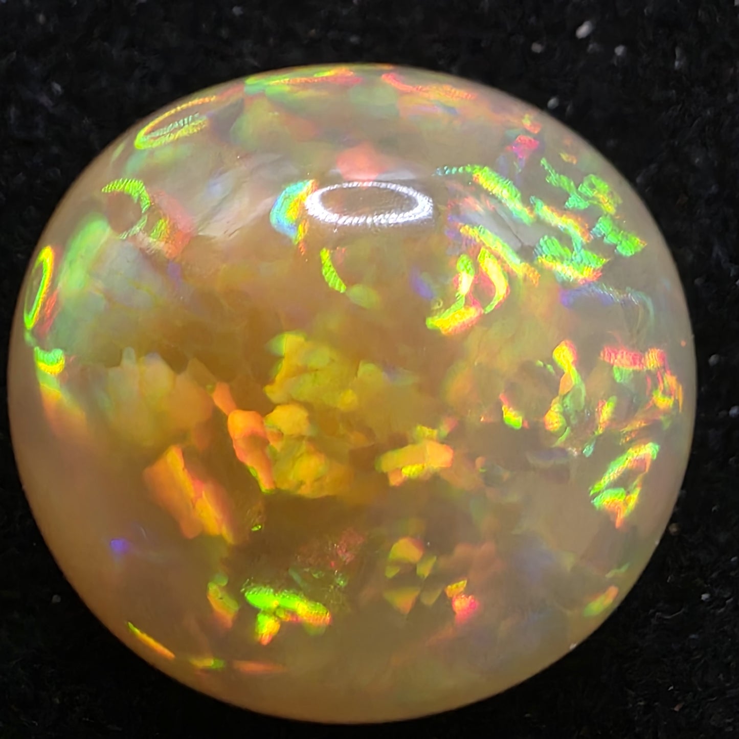 Honey Opal special Ethiopian Welo, 15 ct oval polished, natural