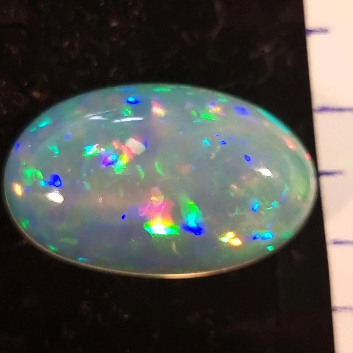 White Opal Ethiopian Welo, 12.3 ct oval polished, natural