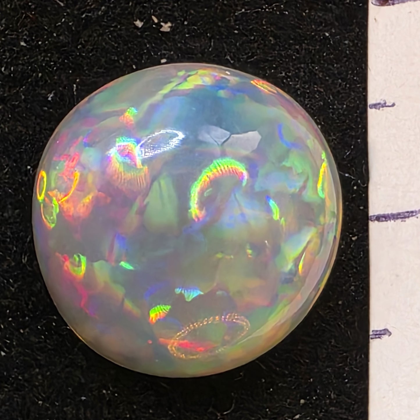 Crystal Opal special Ethiopian Welo, 6.55 ct round polished, natural, intense Play-of-Colour
